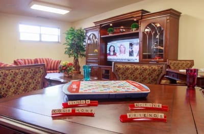 Residents playing a game in a common area