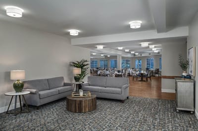 Interior view of a common area with seating and dining space