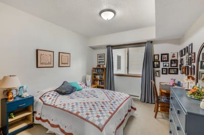 Private resident room with a bed and decor