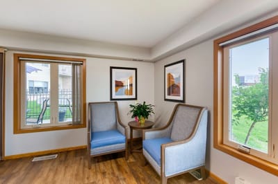 Cozy common area with seating and natural light