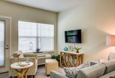 Cozy interior living space with decor and natural light