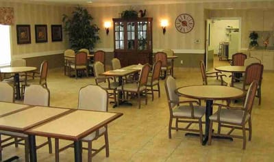 Interior dining area with empty tables and chairs