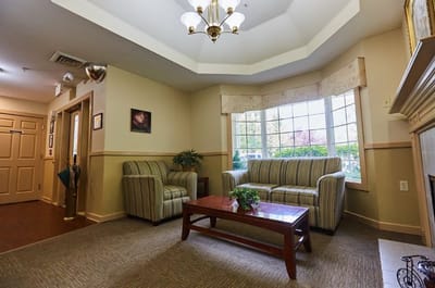 Cozy common area with seating and natural light
