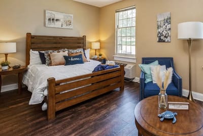Cozy interior bedroom setup with wooden furniture