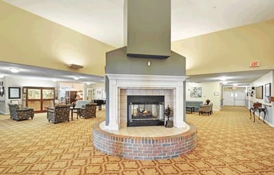 Common area with seating and a fireplace