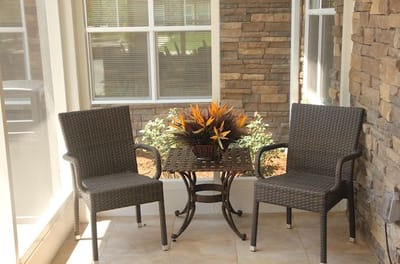 Cozy seating area with plants and a table