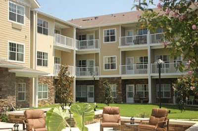 Outdoor courtyard area with seating and building facade