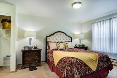 Cozy private resident room with decorative bedding