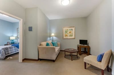 Cozy resident room with seating area and decor