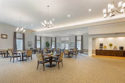 Bright dining room with tables and chairs