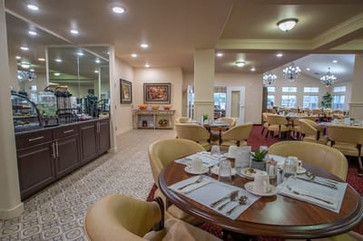 Dining area set for a meal with elegant decor.