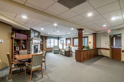 Common area with seating and fireplace