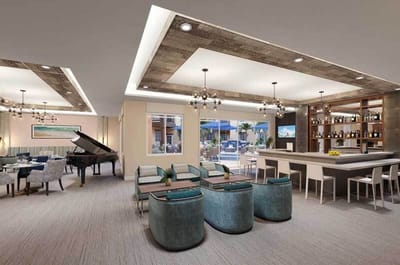 Elegant lounge area with seating and bar