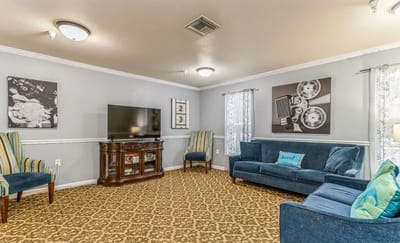 A cozy common area with seating and decor