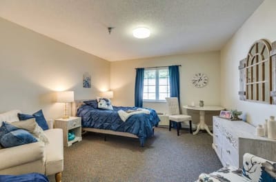 Cozy resident room with bed and furnishings