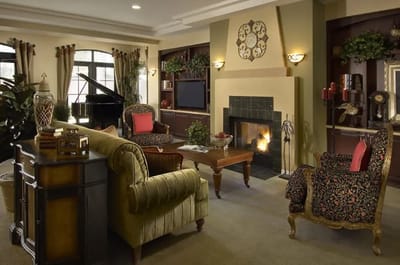 Cozy common area with fireplace and piano