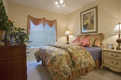Cozy resident room with a bed and decorative touches