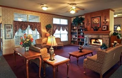 Cozy common area with seating and a fireplace