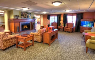 Common area with seating and fireplace