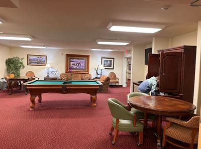 Common area with pool table and seating
