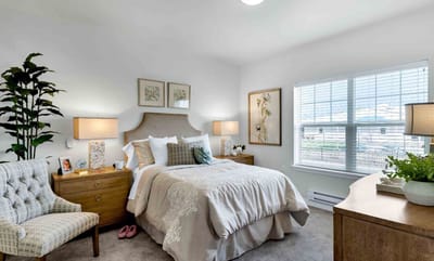 Cozy resident room with a bed and decorative elements