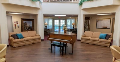 Common area with seating and a piano