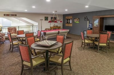 Interior common area with seating and a pool table