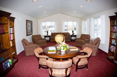 Common area with bookshelves and seating