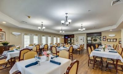 Dining area in a senior living facility, elegantly set up