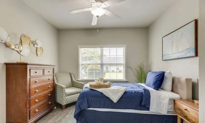 Cozy private resident room with bedding and decor