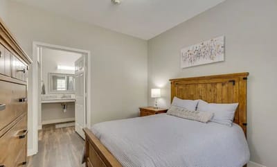Private resident room with a bed and ensuite