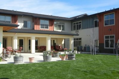 Outdoor garden area with seating and plants