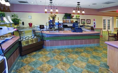 Bright dining area with a coffee bar and seating