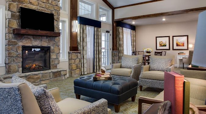 Cozy common area with seating and fireplace