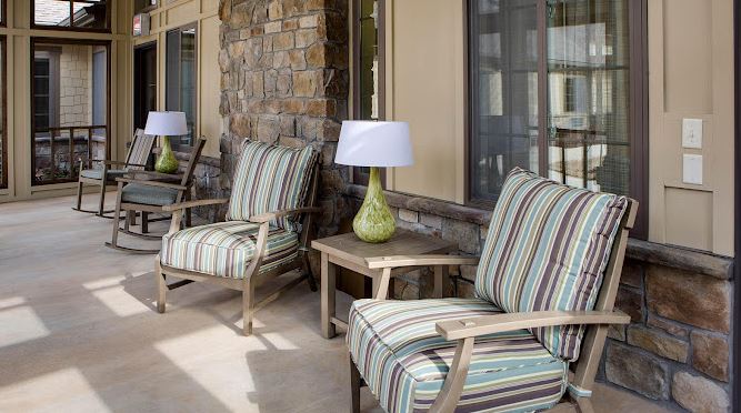 Comfortable outdoor seating area with striped cushions