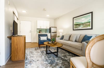 Bright and inviting living area in a senior living apartment