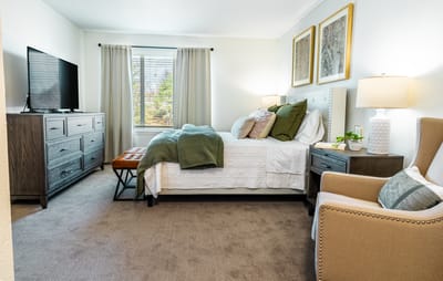 Comfortable private resident room with natural light