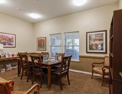 Cozy common area with a dining table and chairs