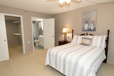 A well-furnished bedroom inside the retirement center