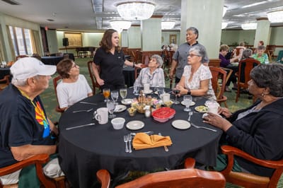Residents enjoying a meal in the dining room