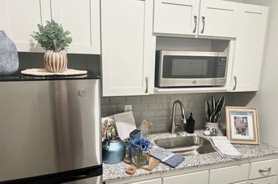 A well-decorated kitchenette in a senior living facility