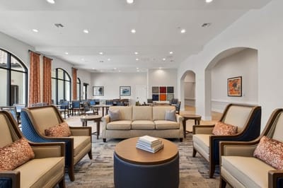 Interior common area with seating and bright lighting