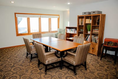 Common area with a large table and seating