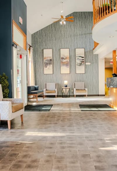 Bright lobby area with seating and decor