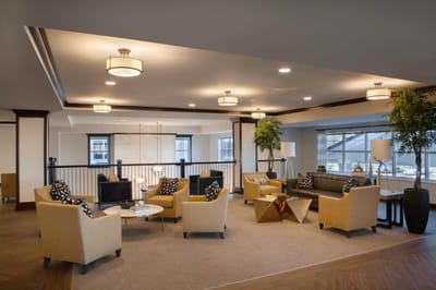 A cozy common area with seating and decor