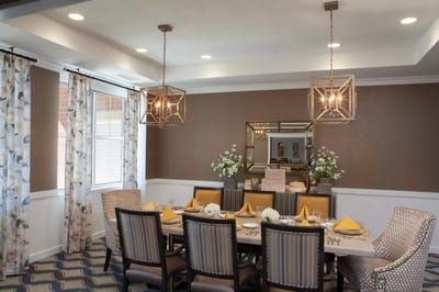 Elegant dining room with stylish decor and table settings