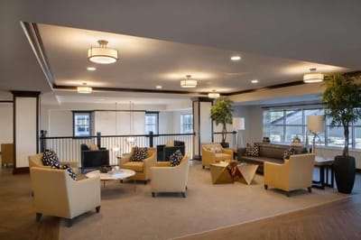 Bright and spacious common area with seating arrangements