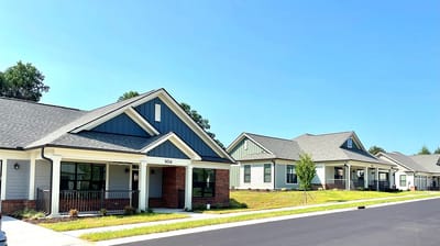Exterior view of several single-story residential buildings