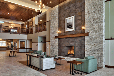 Interior view of a cozy lounge area with a fireplace