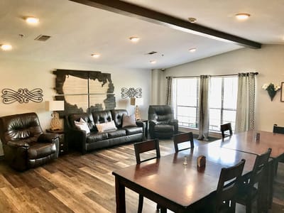 Cozy common area with seating and wooden decor